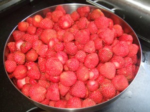 big bowl of strawberries close up